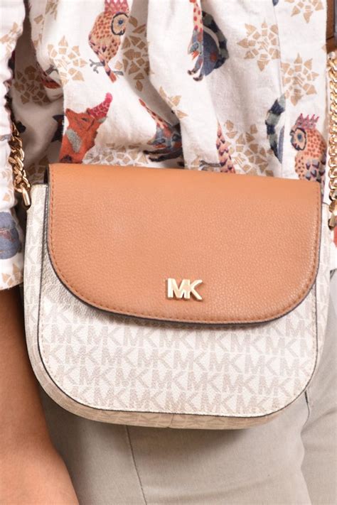 michael michael kors mott logo dome crossbody|Michael Kors Crossbody large purses.